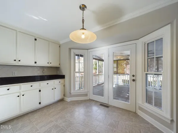 a kitchen with stainless steel appliances a stove refrigerator sink and cabinets
