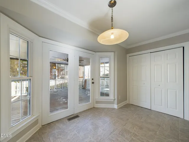 a view of hallway with closet