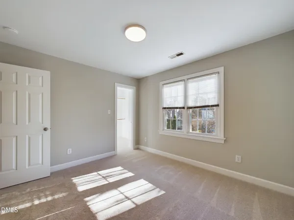 a view of a window in an empty room