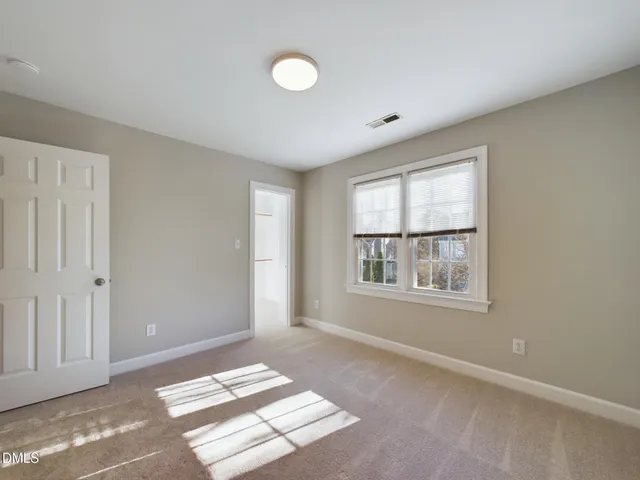 a view of a window in an empty room