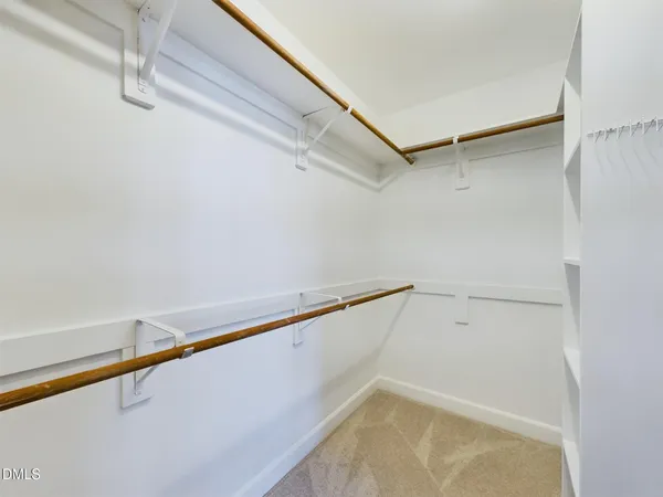 a view of a room with a fan