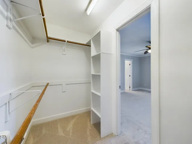 a view of a big room with carpet