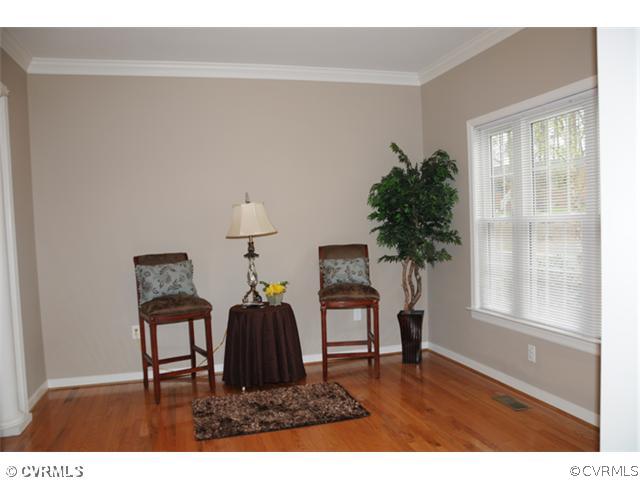 9525 Meadowview Road Henrico, VA 23294 - Photo 3 of 12 a living room with furniture and a potted plant