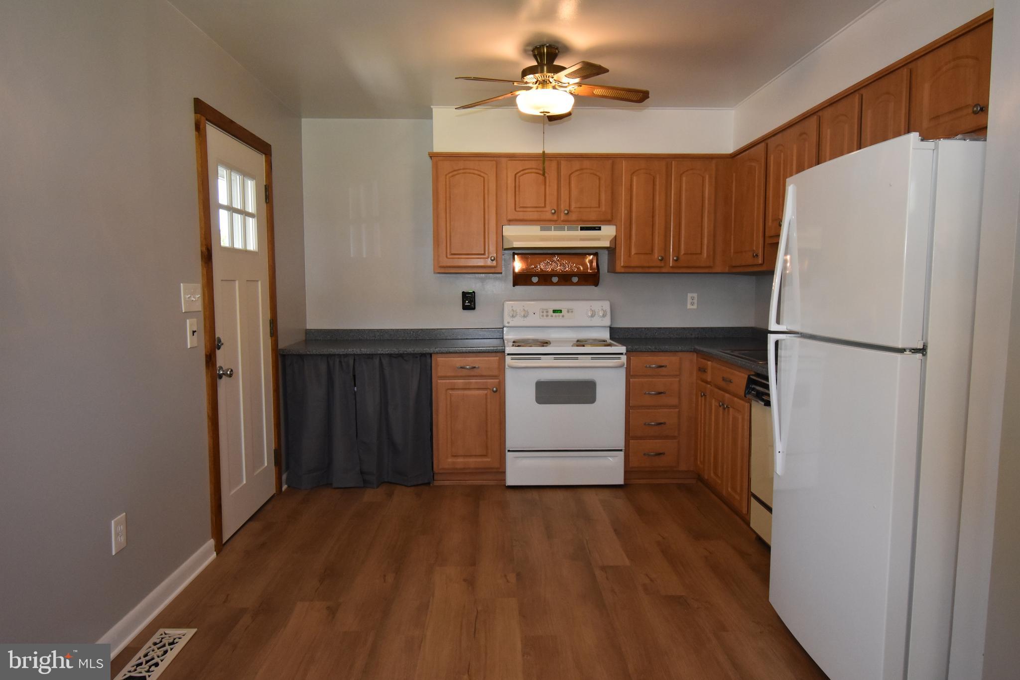 7320 Tred Avon Road Middle River, MD 21220 - Photo 15 of 29 Kitchen w/Side Door to Covered Deck