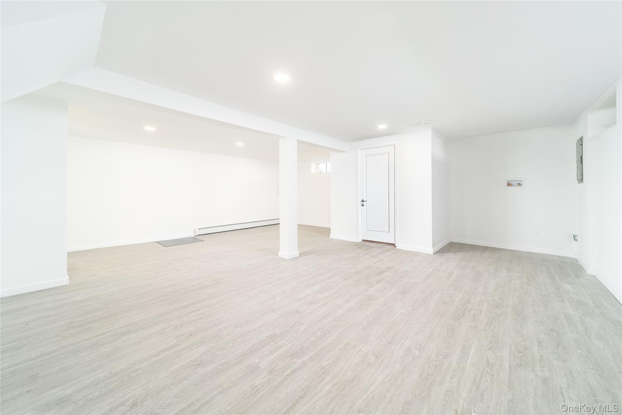 8 Spector Lane Plainview, NY 11803 - Photo 13 of 15 a view of an empty room