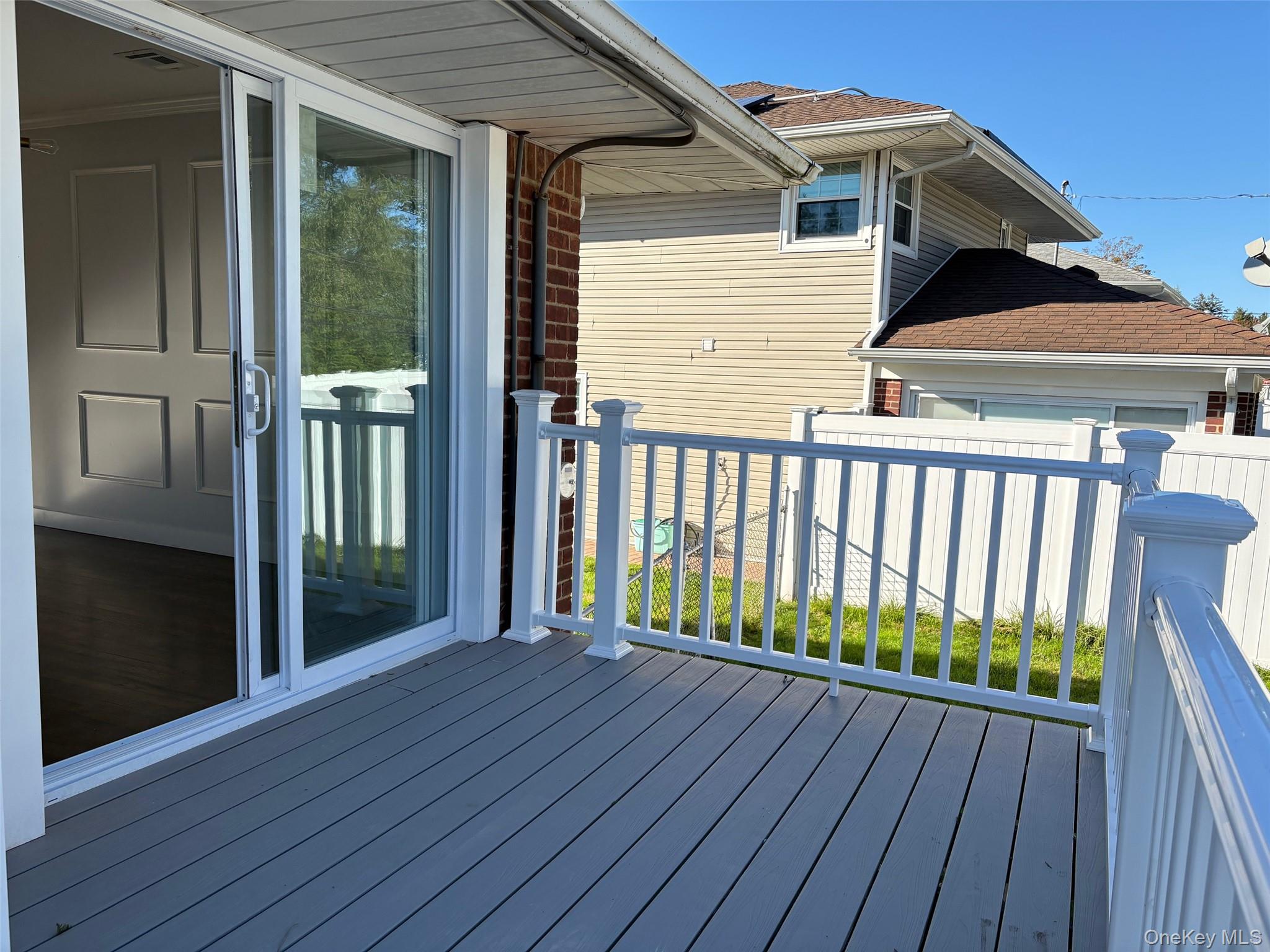 8 Spector Lane Plainview, NY 11803 - Photo 14 of 15 a view of wooden balcony