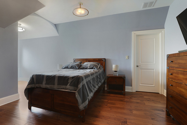 218 Shadow Ridge Court Palos Park, IL 60464 - Photo 27 of 40 a bedroom with a bed and wooden floor