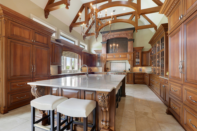 218 Shadow Ridge Court Palos Park, IL 60464 - Photo 6 of 40 a view of a dining room with furniture and a chandelier