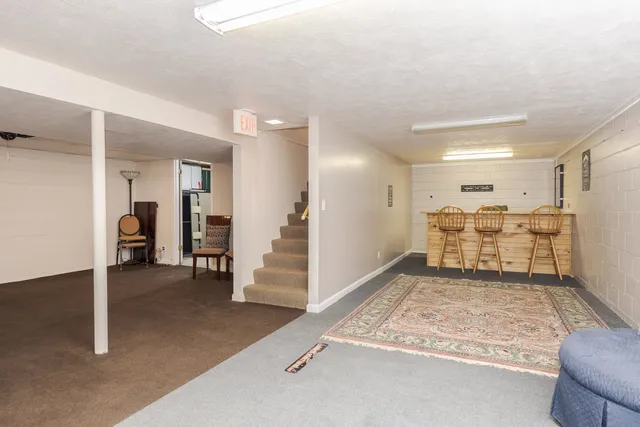 a view of a hallway with a kitchen