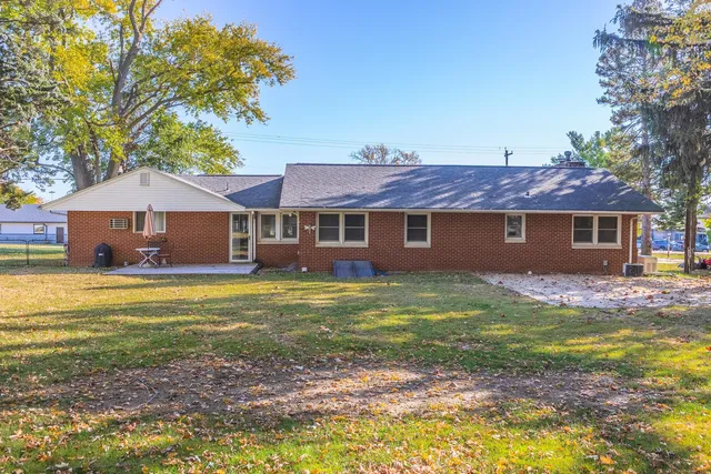 a view of a house with a swimming pool