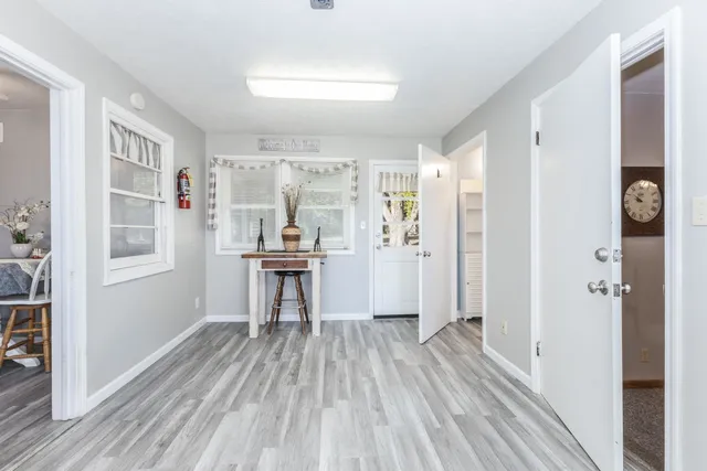 a view of a kitchen from the hallway