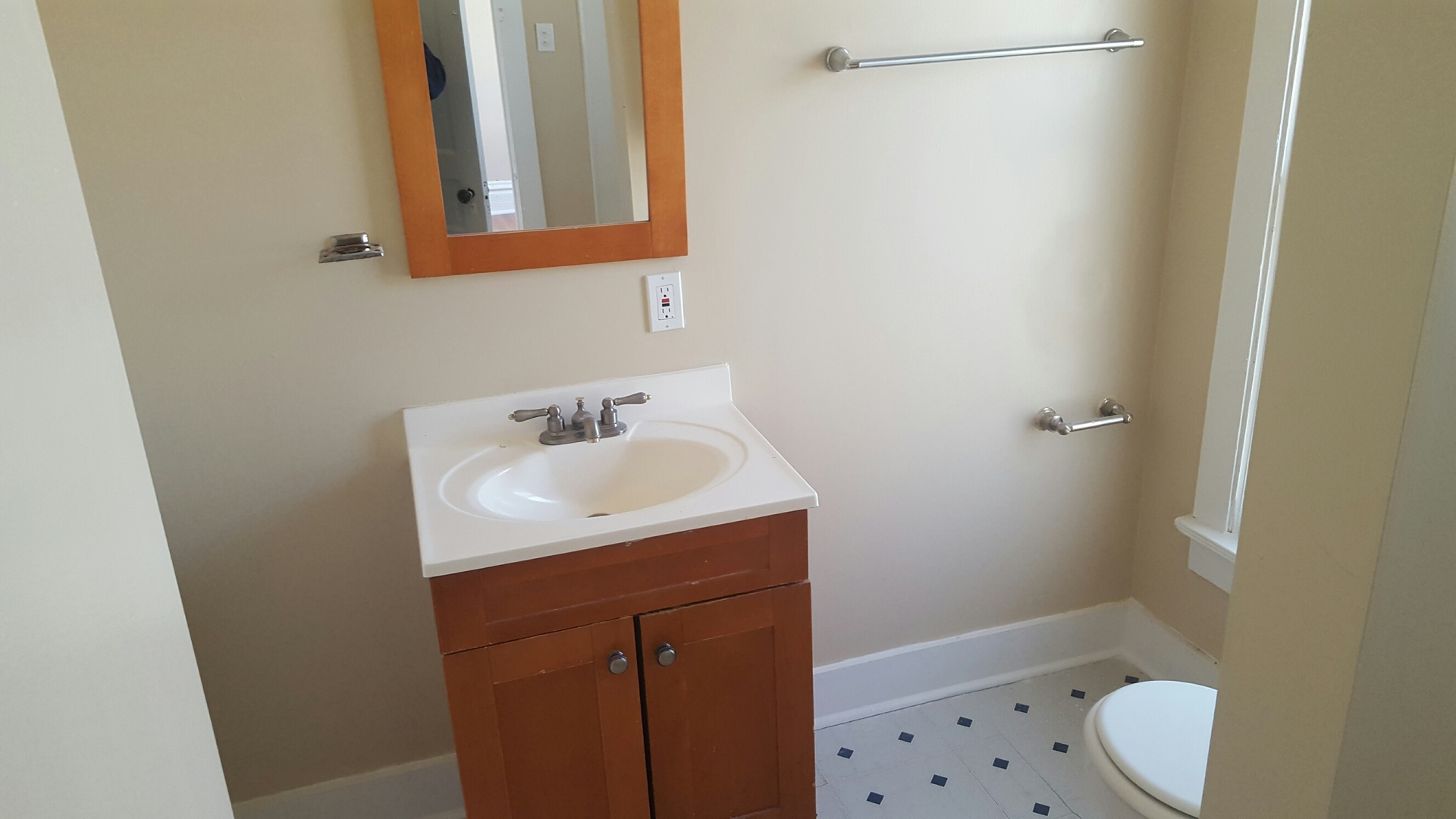 486 Ashland Avenue Elgin, IL 60123 - Photo 18 of 21 a bathroom with a sink a toilet and shower