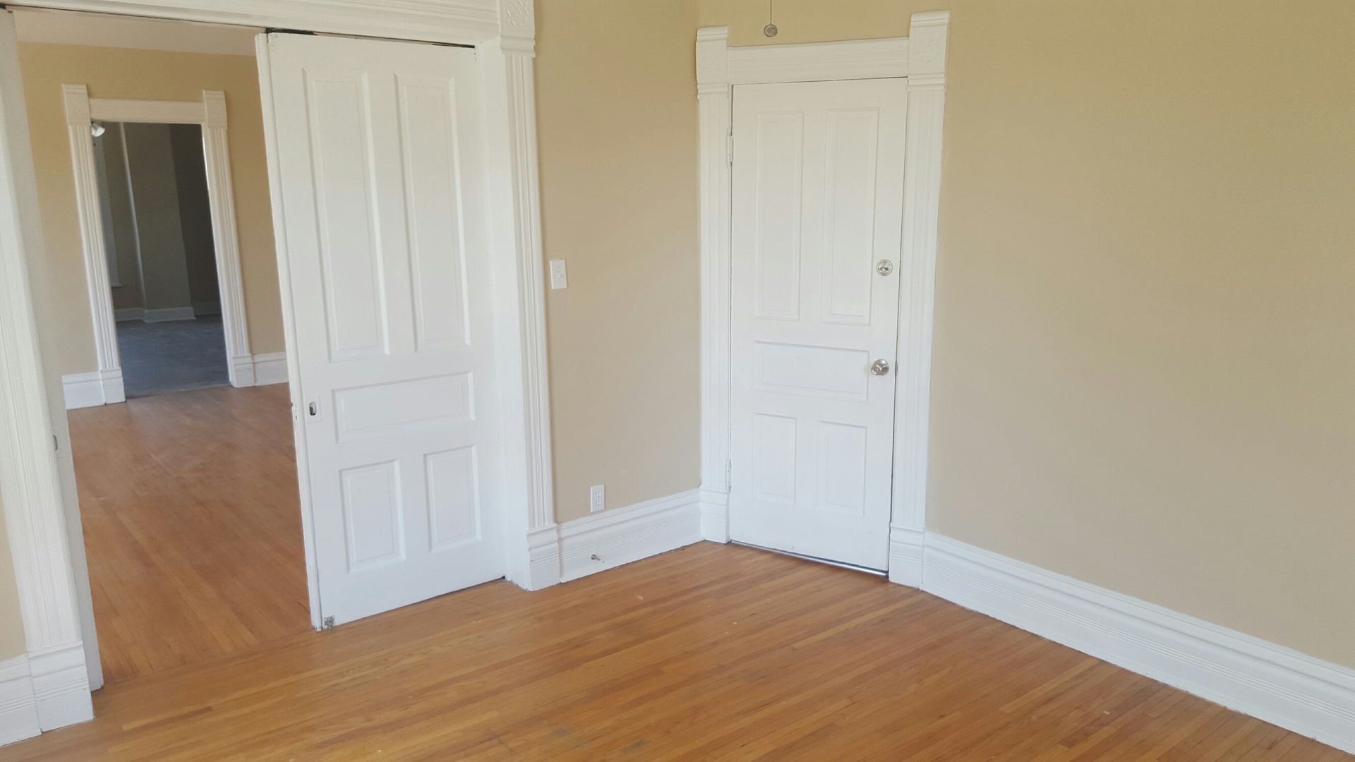 486 Ashland Avenue Elgin, IL 60123 - Photo 19 of 21 a view of a hallway with wooden floor
