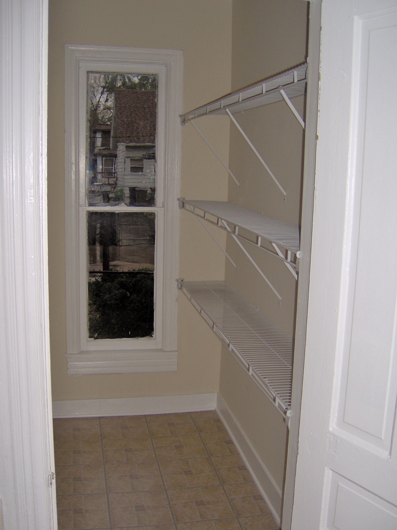 486 Ashland Avenue Elgin, IL 60123 - Photo 9 of 21 a view of an empty walk in closet