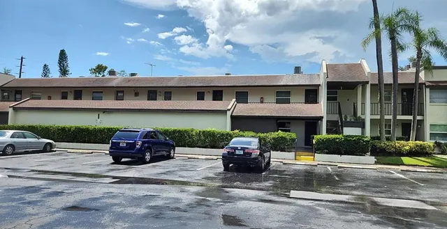 a car parked in front of a house