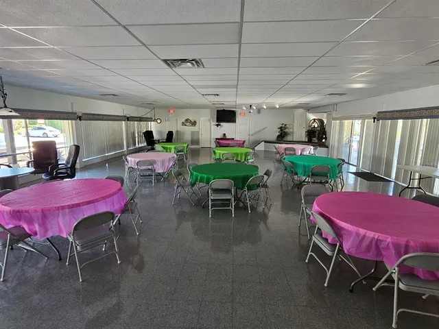 a view of a dining room with furniture