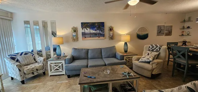 a living room with furniture and a couch