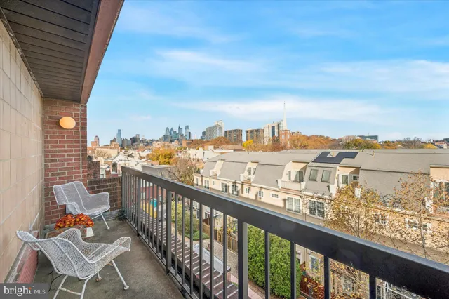a view of a balcony with an ocean view