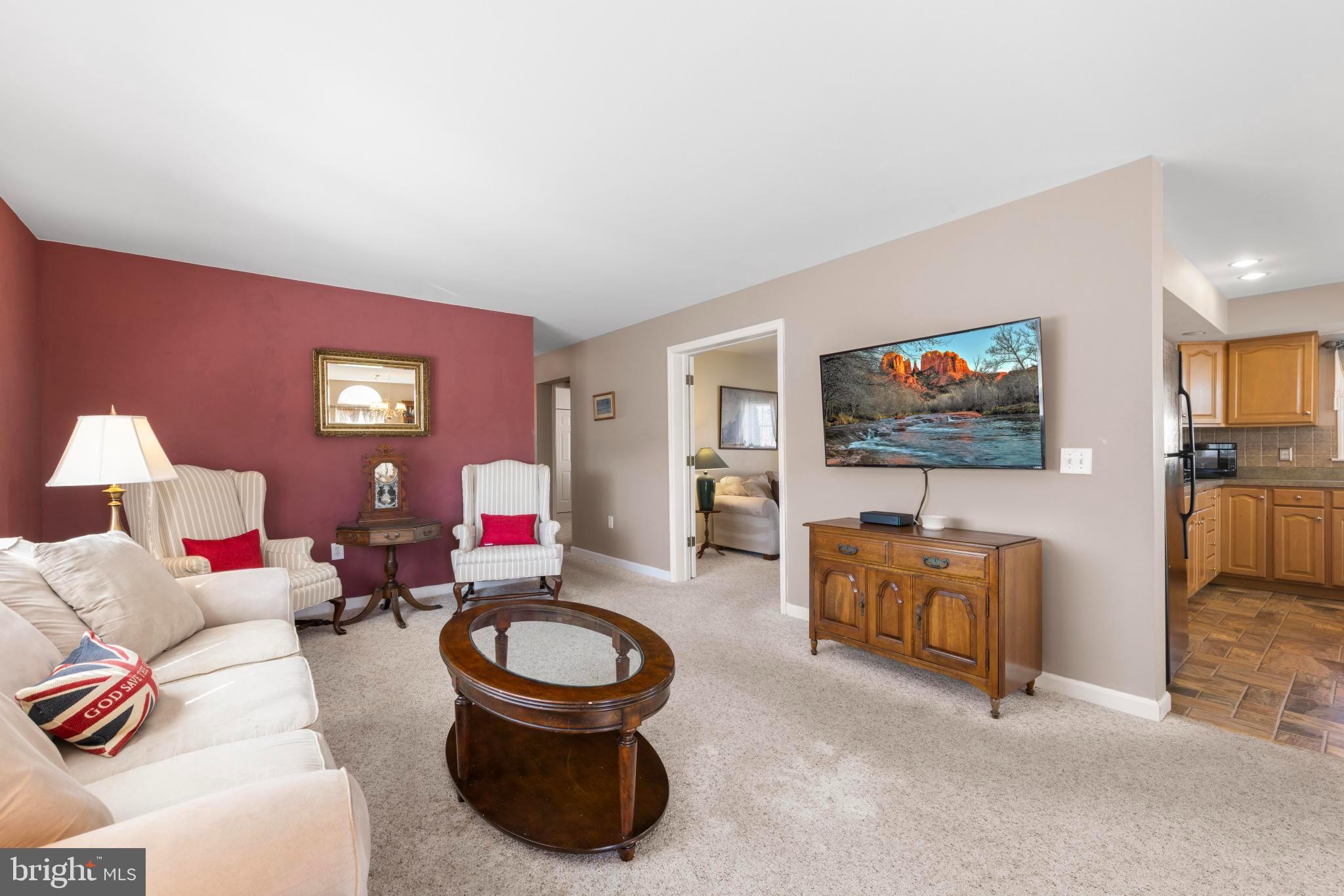 75 Oak Ridge Lane Manahawkin, NJ 08050 - Photo 18 of 50 a living room with furniture and a flat screen tv