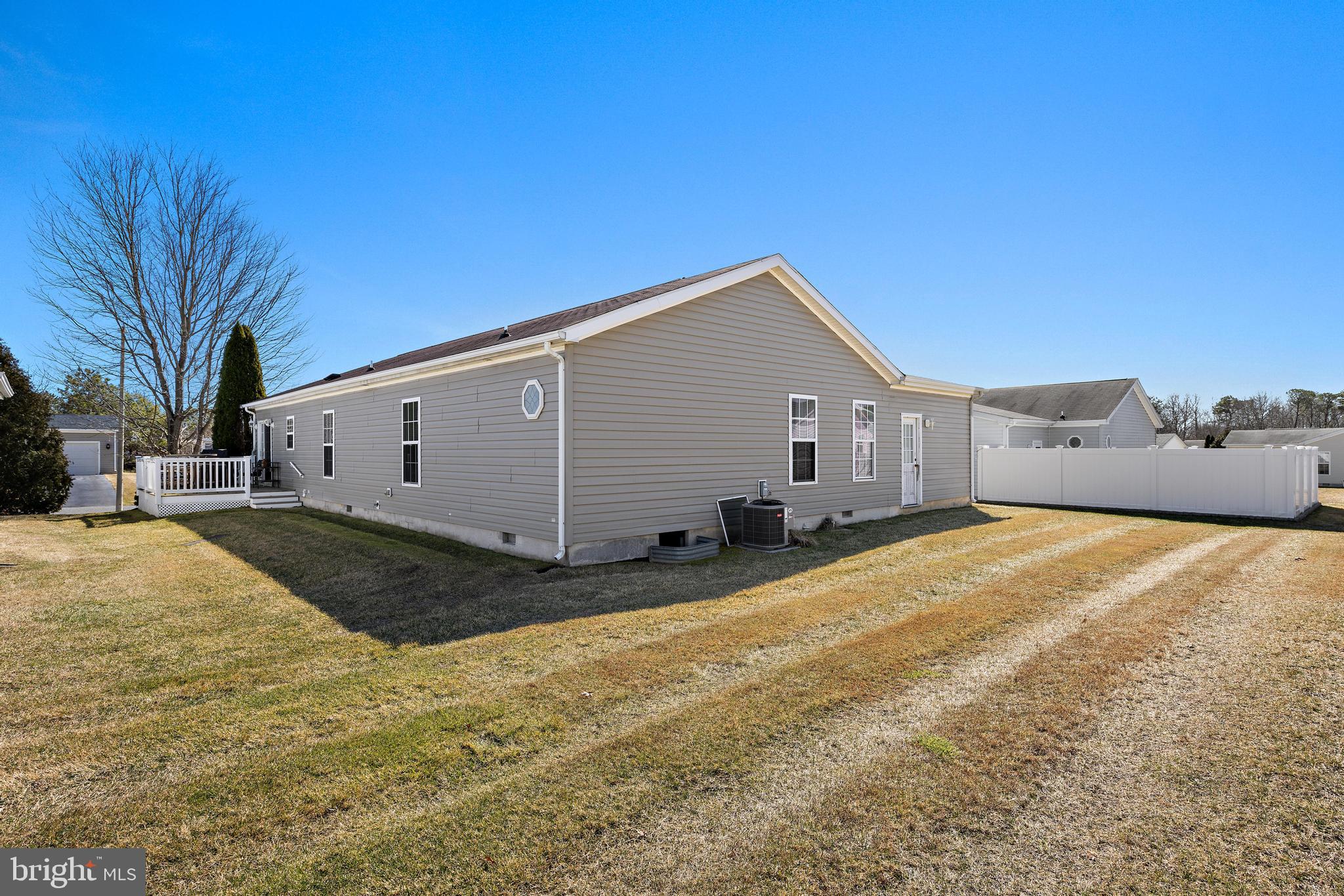 75 Oak Ridge Lane Manahawkin, NJ 08050 - Photo 35 of 50 a view of a house with a yard