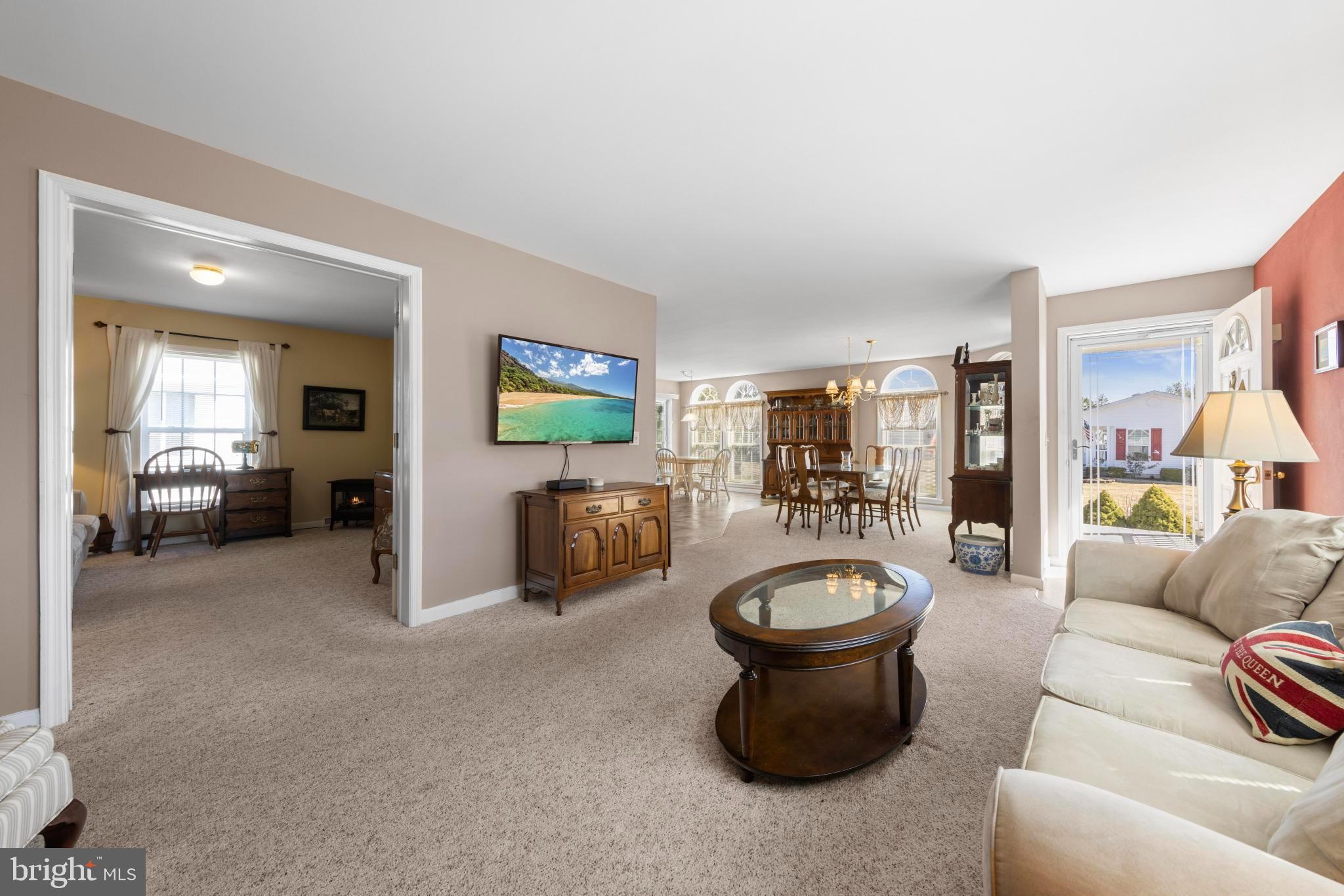 75 Oak Ridge Lane Manahawkin, NJ 08050 - Photo 4 of 50 a living room with furniture and a large window