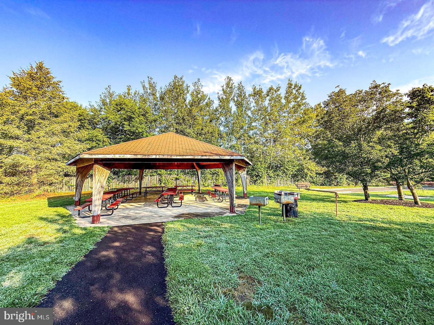 75 Oak Ridge Lane Manahawkin, NJ 08050 - Photo 46 of 50 a view of a garden with an outdoor space