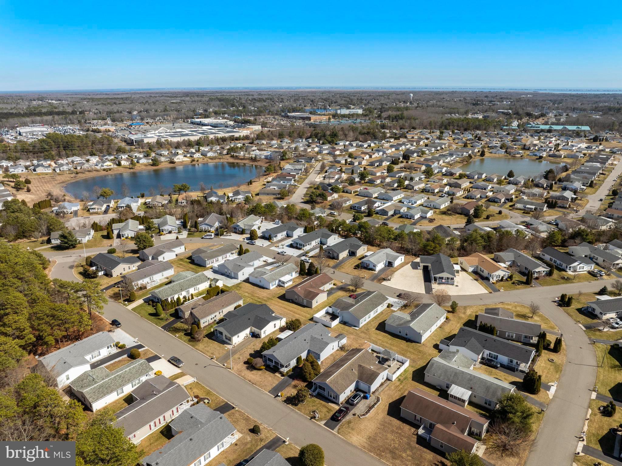 75 Oak Ridge Lane Manahawkin, NJ 08050 - Photo 48 of 50 an aerial view of a city with ocean
