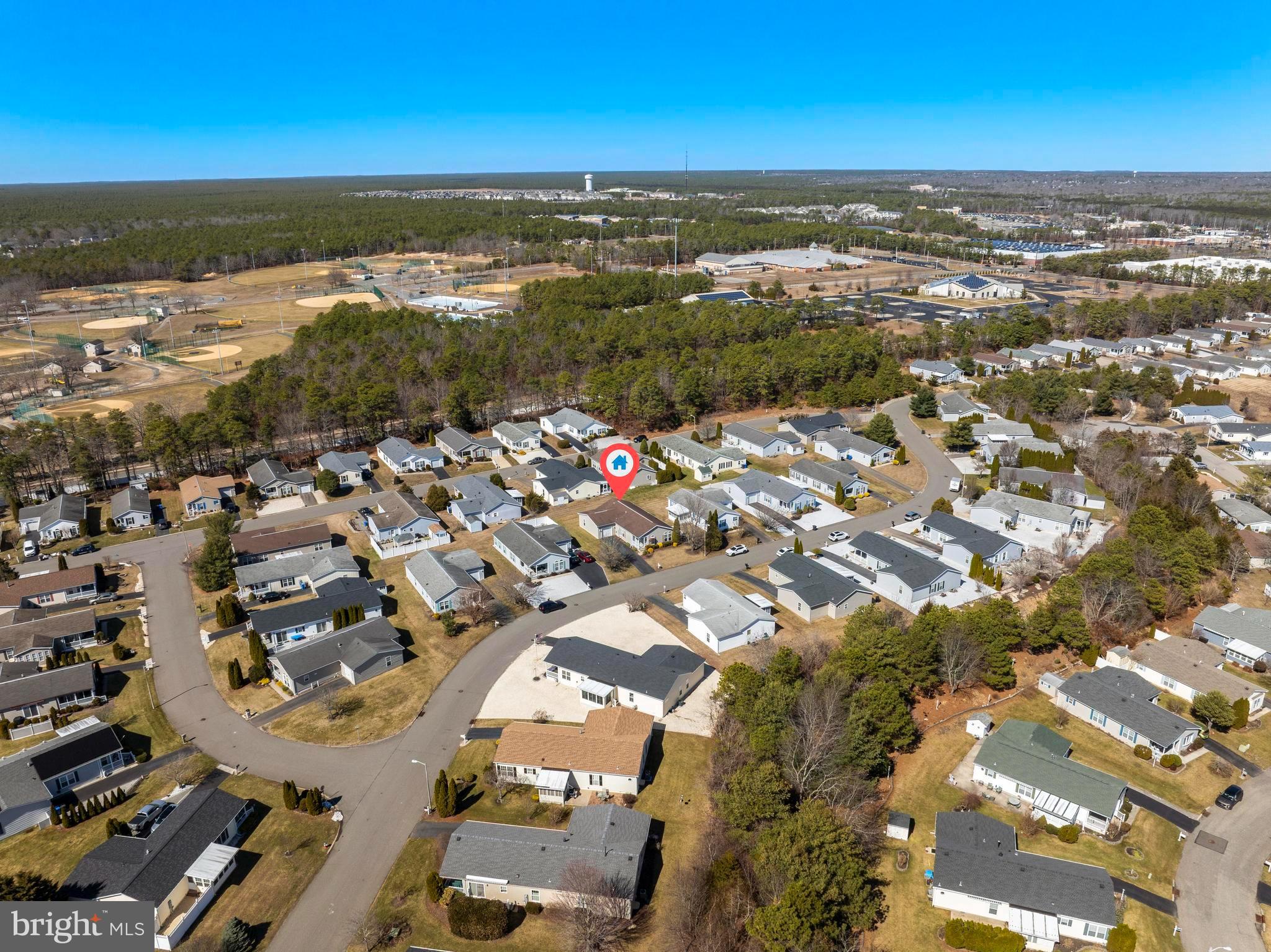 75 Oak Ridge Lane Manahawkin, NJ 08050 - Photo 49 of 50 an aerial view of ocean and residential houses with outdoor space