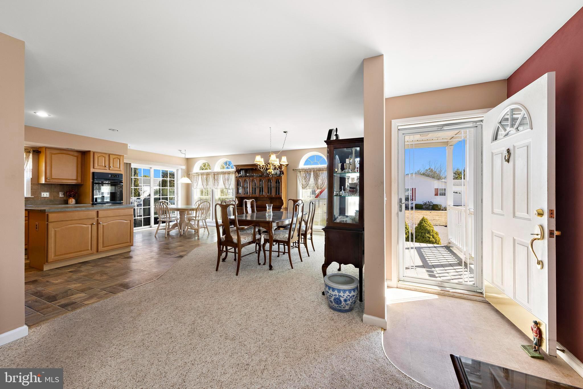 75 Oak Ridge Lane Manahawkin, NJ 08050 - Photo 5 of 50 a view of a living room and kitchen view