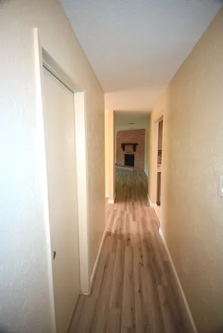 a view of a bedroom from a hallway