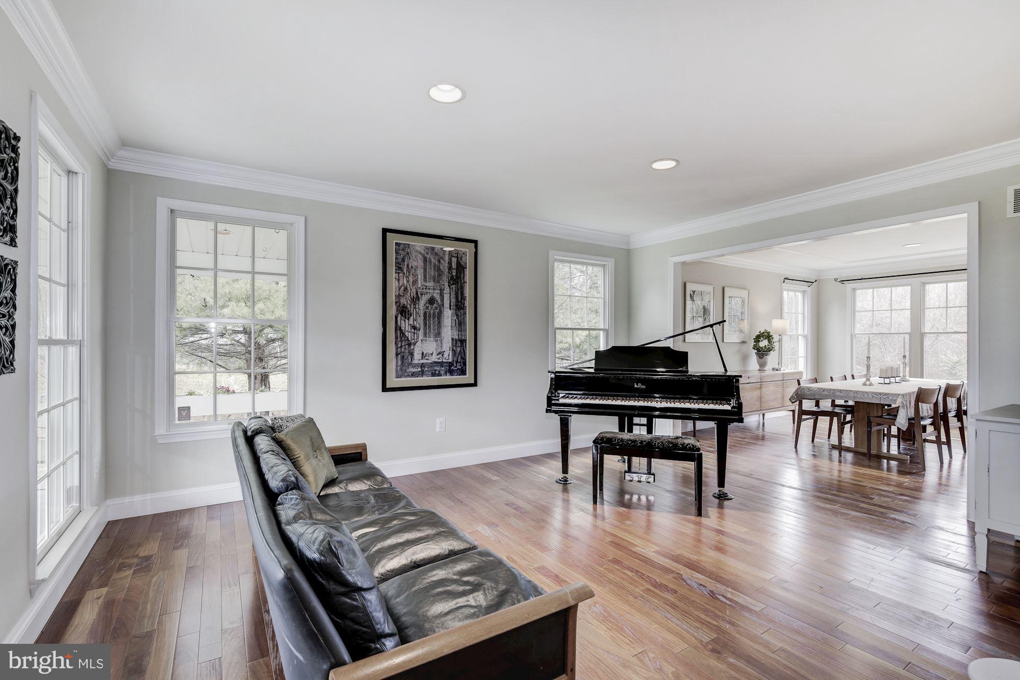 5508 Adams Ridge Road Clarksville, MD 21029 - Photo 11 of 54 Formal living room with hardwood floors.