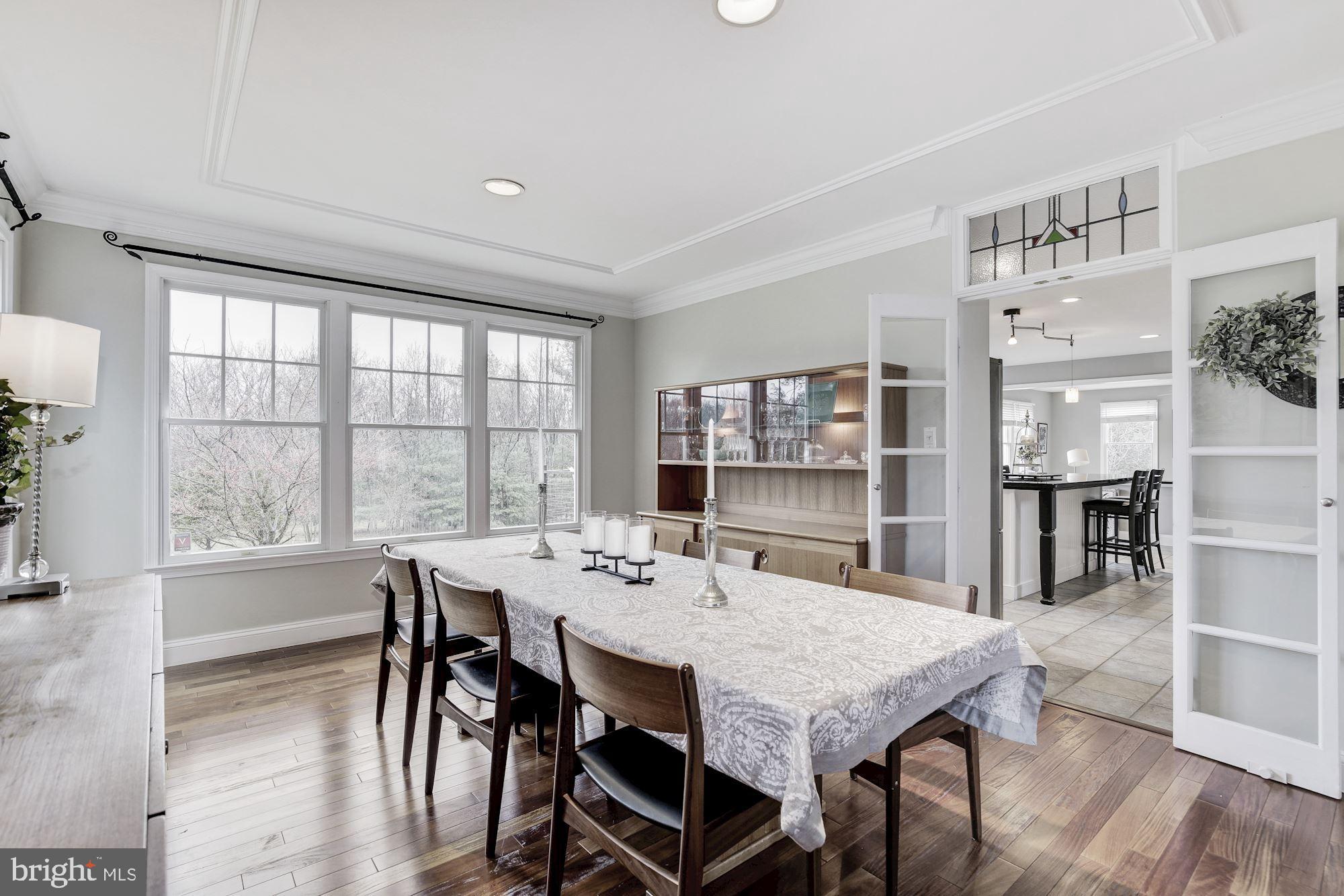 5508 Adams Ridge Road Clarksville, MD 21029 - Photo 14 of 54 Formal dining room with hardwood floors.