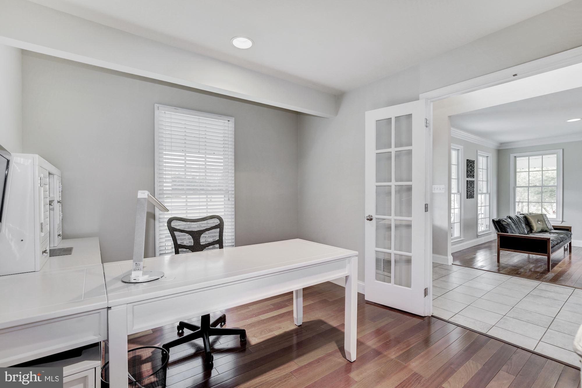 5508 Adams Ridge Road Clarksville, MD 21029 - Photo 16 of 54 Home office with hardwood floors.