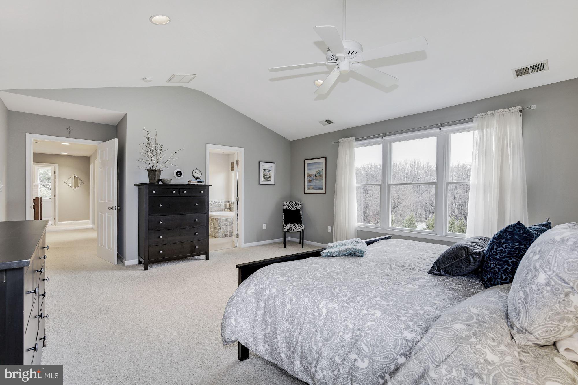 5508 Adams Ridge Road Clarksville, MD 21029 - Photo 27 of 54 Master bedroom with en-suite full bathroom.