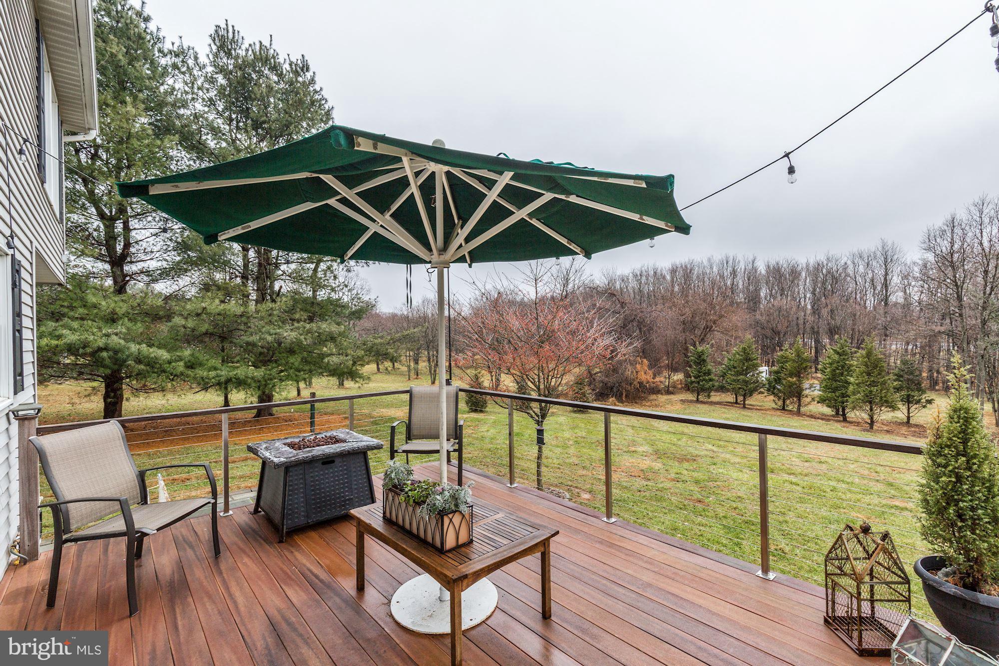 5508 Adams Ridge Road Clarksville, MD 21029 - Photo 45 of 54 Deck w/ composite planks and IPE railing top.