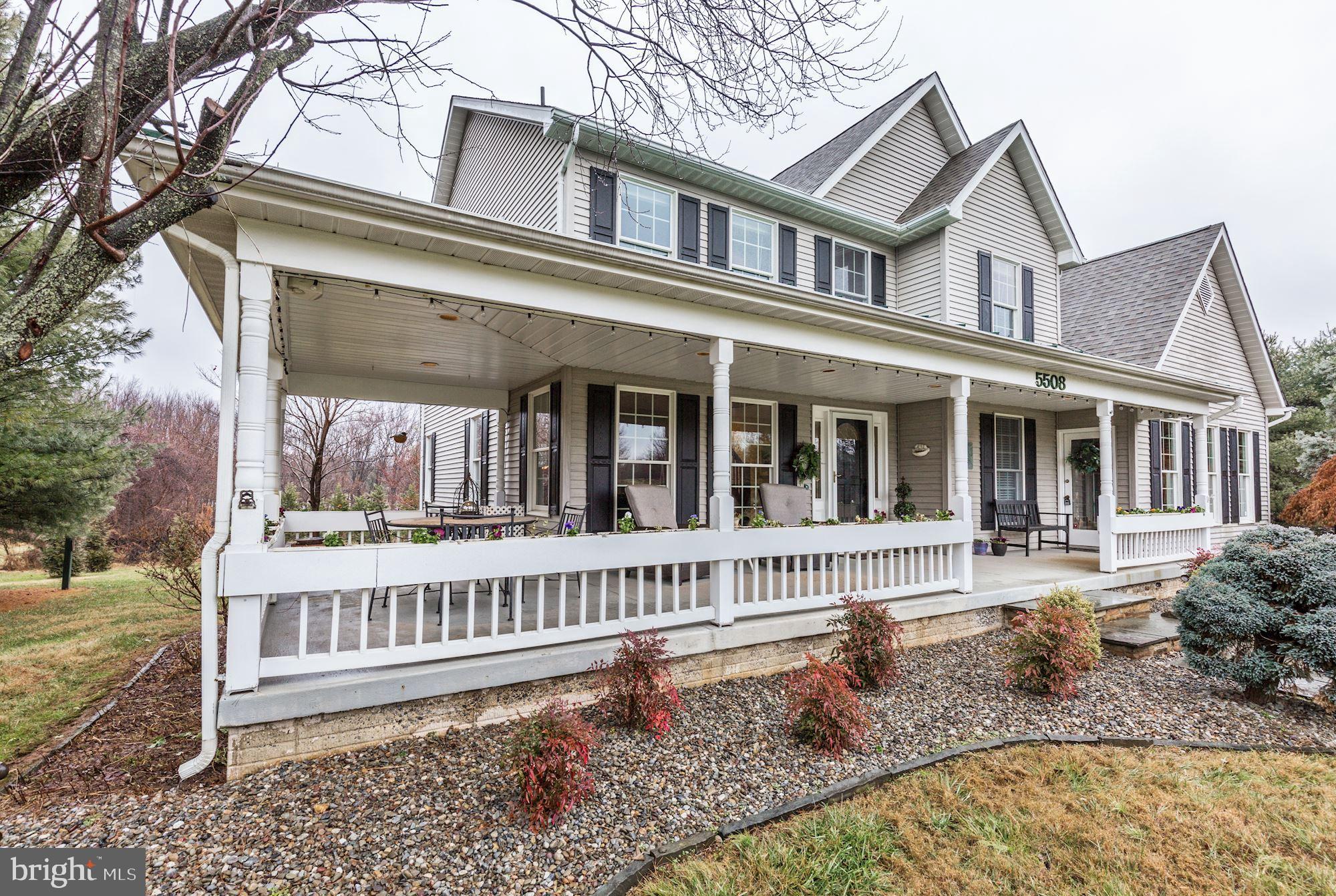 5508 Adams Ridge Road Clarksville, MD 21029 - Photo 54 of 54 Huge wraparound front porch.