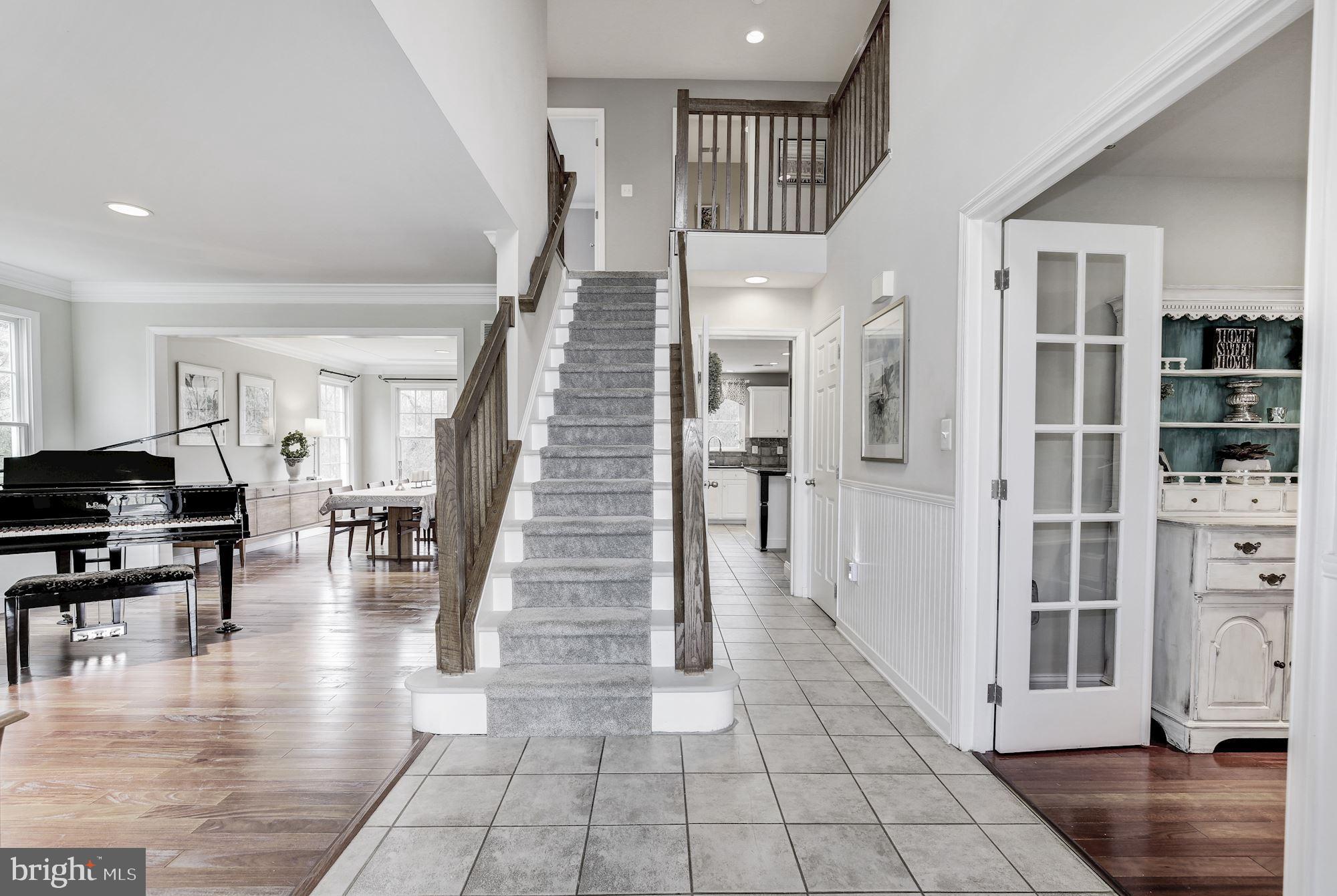 5508 Adams Ridge Road Clarksville, MD 21029 - Photo 10 of 54 Two-story foyer.