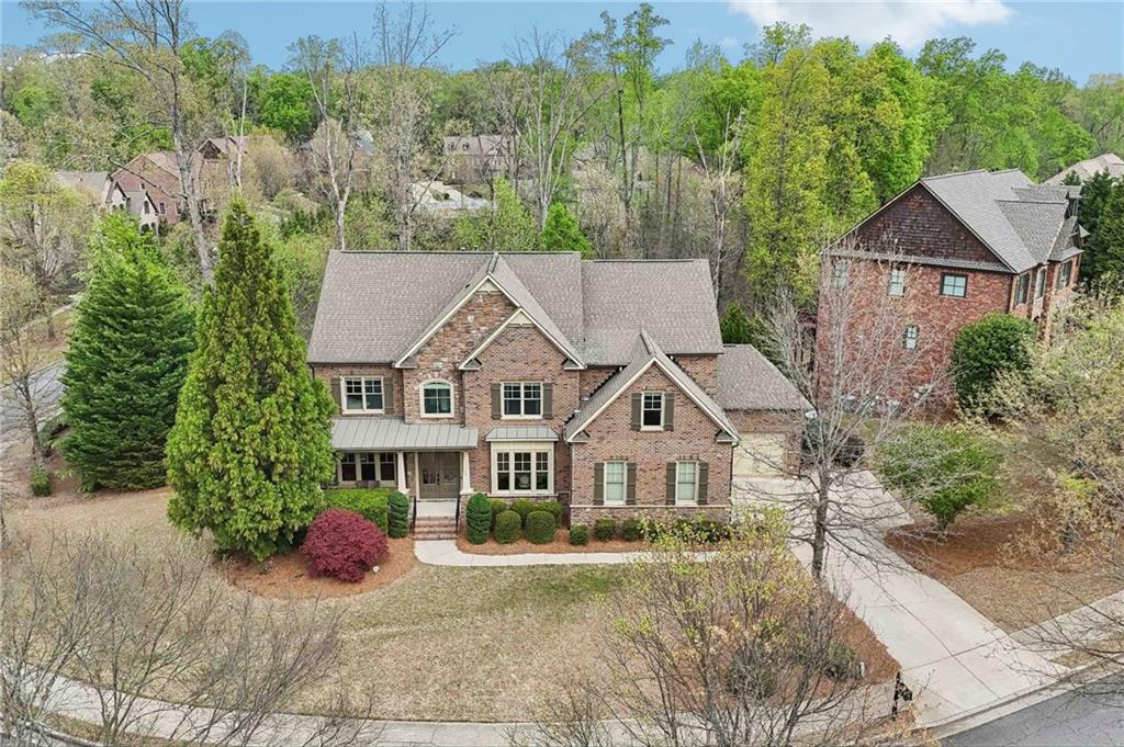 1710 Bramble Bush Way Suwanee, GA 30024 - Photo 35 of 40 an aerial view of a house with yard and green space