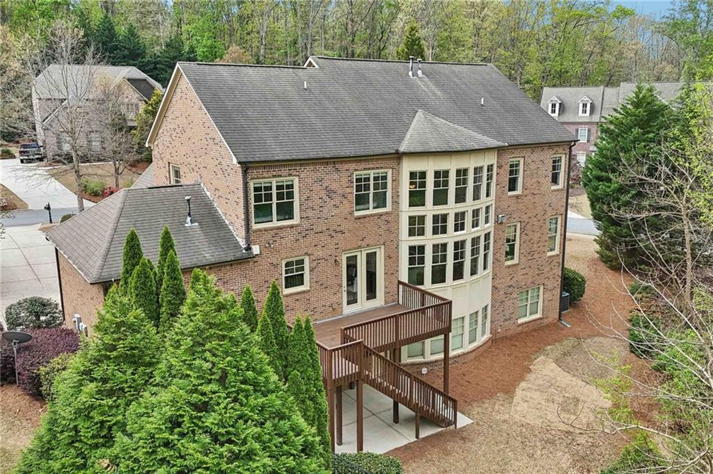 1710 Bramble Bush Way Suwanee, GA 30024 - Photo 38 of 40 an aerial view of a house with table and chairs