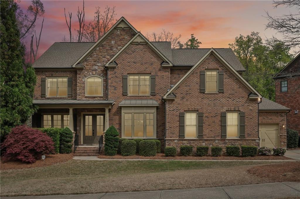 1710 Bramble Bush Way Suwanee, GA 30024 - Photo 40 of 40 a front view of a house