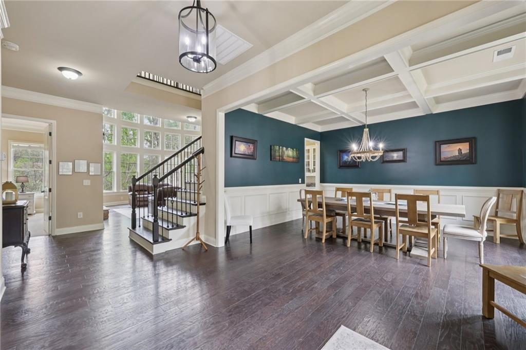 1710 Bramble Bush Way Suwanee, GA 30024 - Photo 8 of 40 a view of a livingroom with furniture wooden floor and windows