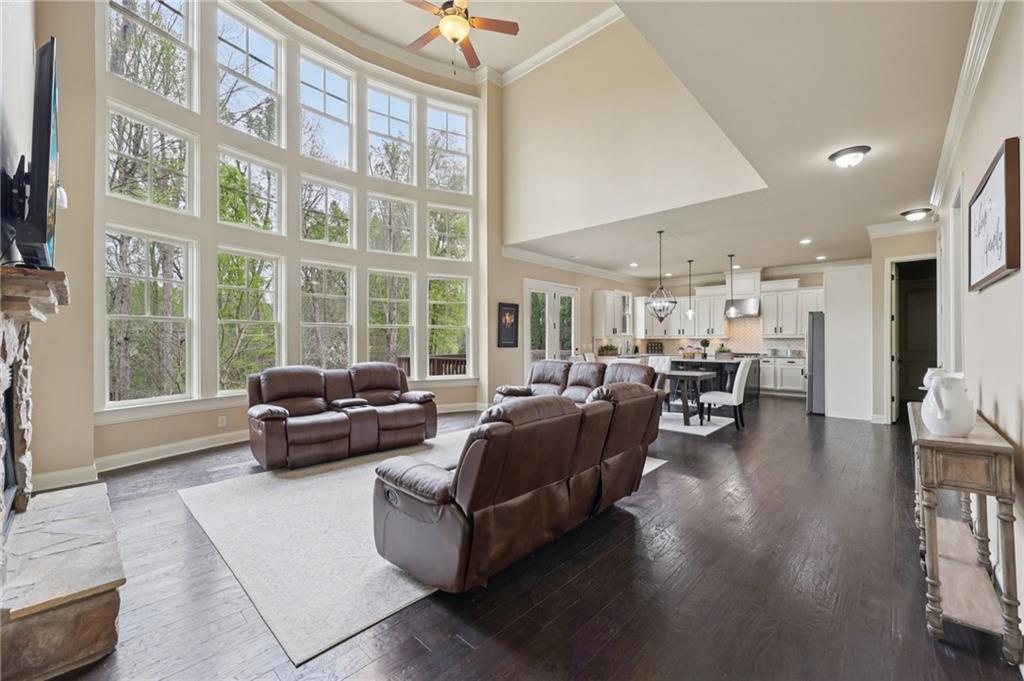 1710 Bramble Bush Way Suwanee, GA 30024 - Photo 9 of 40 a living room with furniture and a large window