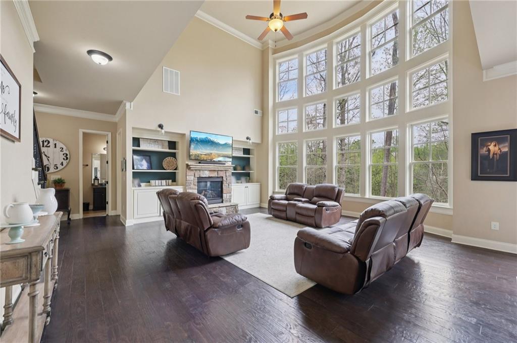 1710 Bramble Bush Way Suwanee, GA 30024 - Photo 10 of 40 a living room with furniture and a large window