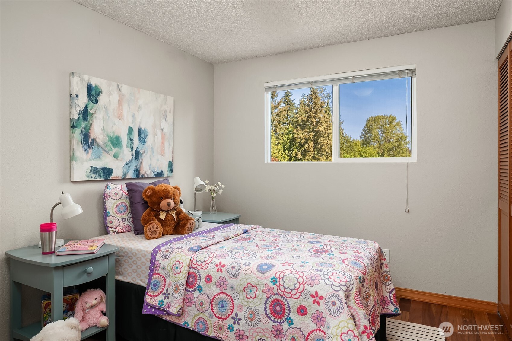 21331 2nd Avenue Southeast Bothell, WA 98021 - Photo 16 of 34 a bedroom with a bed and a window
