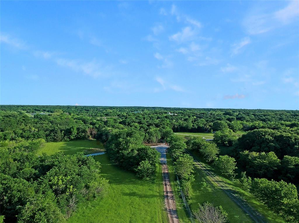 7304 Shady Lane Scurry, TX 75158 - Photo 17 of 40 Aerial overview of property's location with a forest