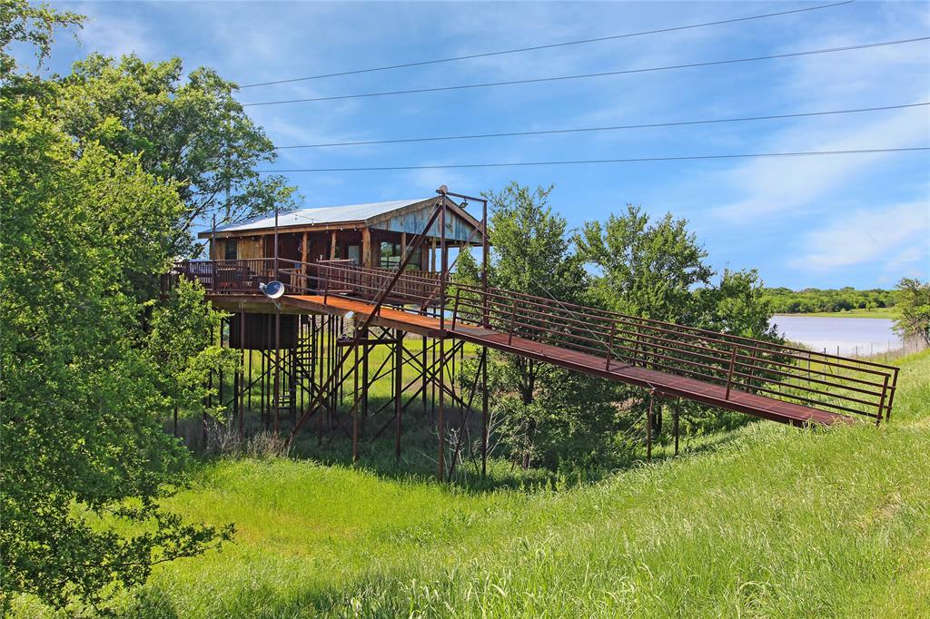 7304 Shady Lane Scurry, TX 75158 - Photo 22 of 40 View of jungle gym featuring a water view