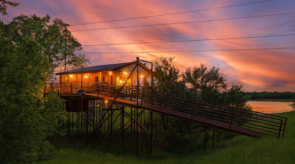 7304 Shady Lane Scurry, TX 75158 - Photo 6 of 40 View of back of house at dusk