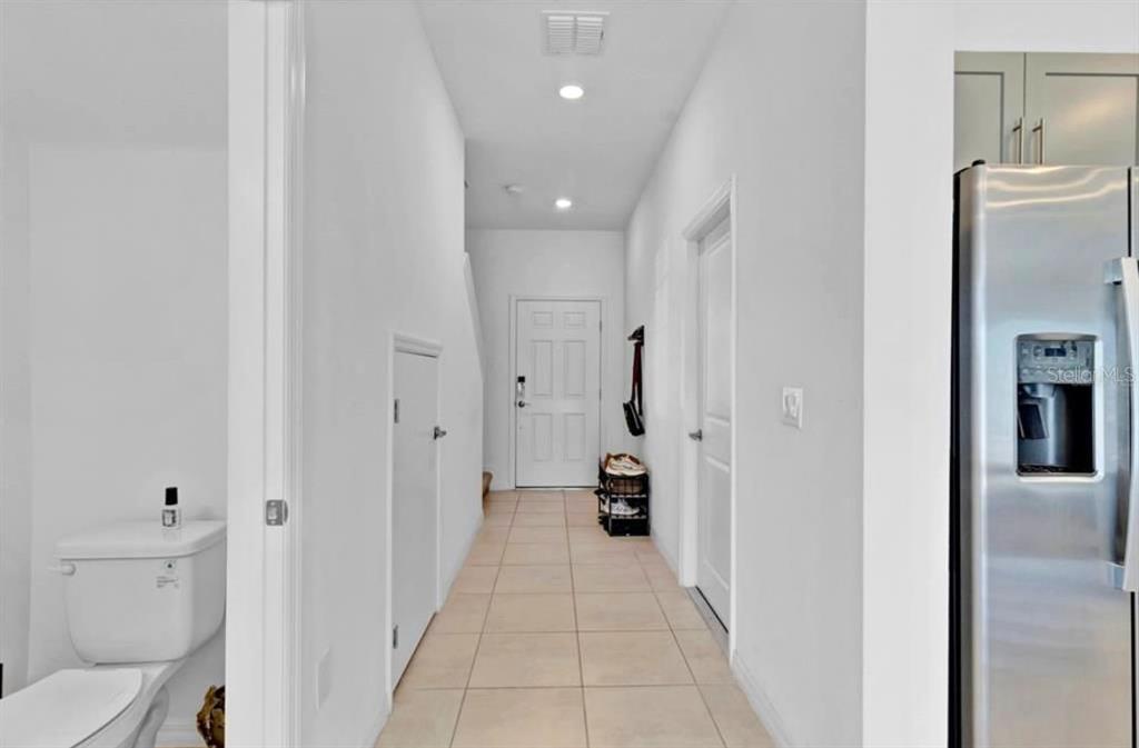 3609 Anibal Street Kissimmee, FL 34746 - Photo 16 of 17 a bathroom with a sink and a mirror