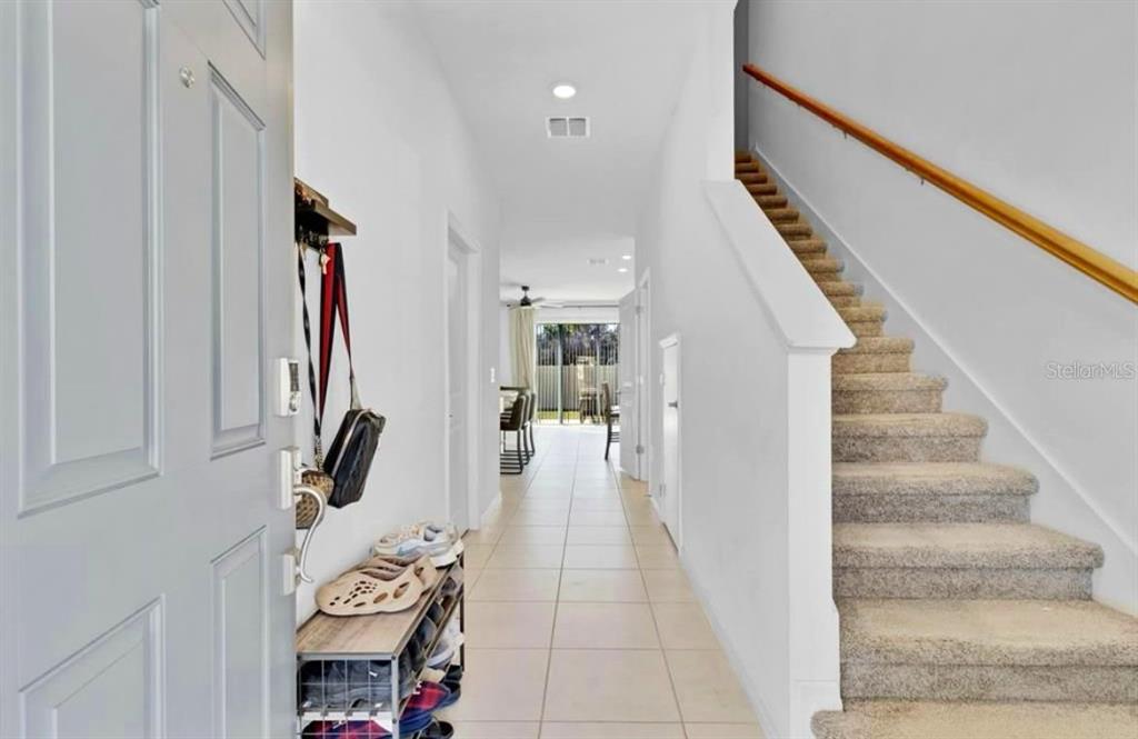 3609 Anibal Street Kissimmee, FL 34746 - Photo 5 of 17 a view of a hallway with seating area