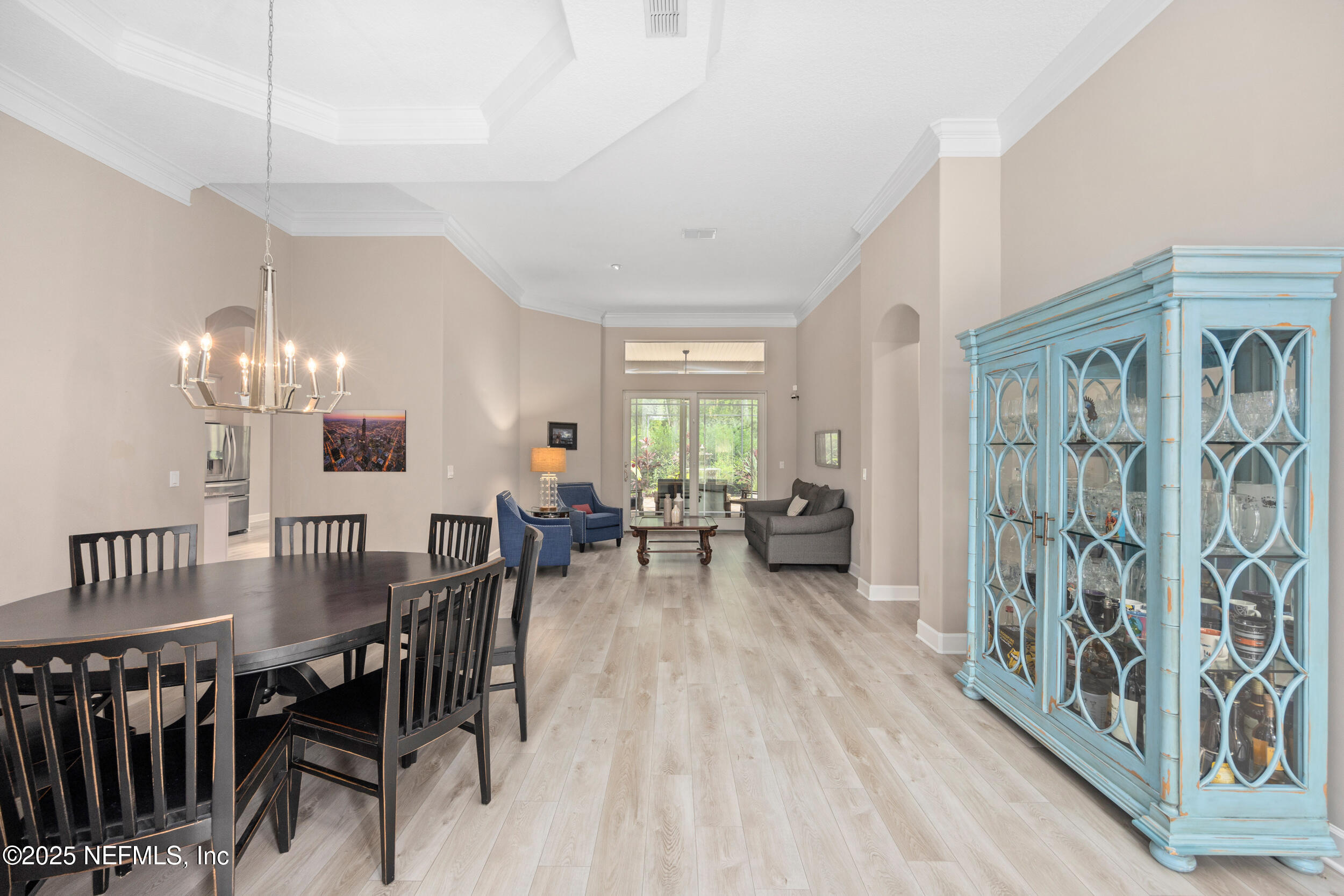 1854 West Cobblestone Lane St. Augustine, FL 32092 - Photo 16 of 72 a view of a dining room with furniture window and wooden floor